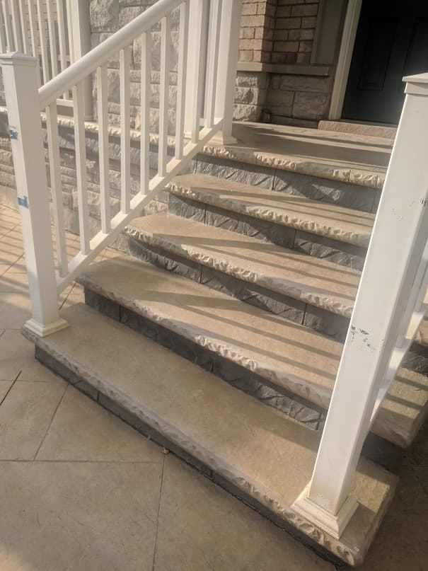 Stamped concrete steps with stone risers