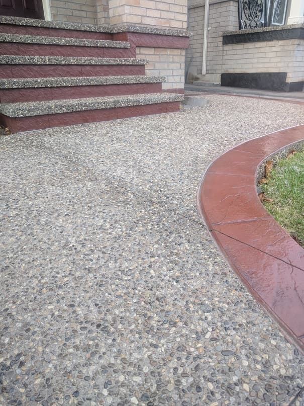 Exposed aggregate walkway with stamped border