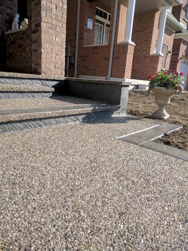 Exposed aggregate walkway with stamped border