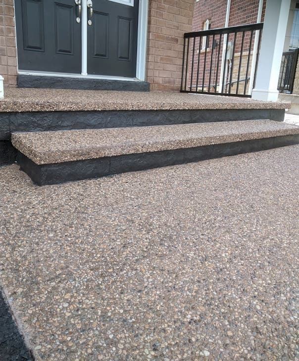 Exposed aggregate steps with dark stamped risers