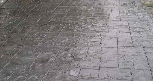 Stamped ashlar concrete patio in grey