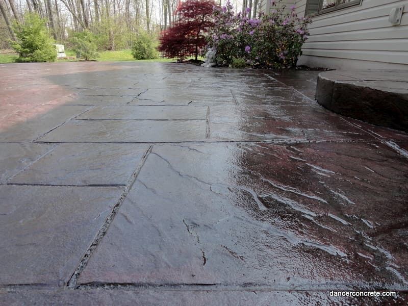 Stamped concrete patio in dark slate finish